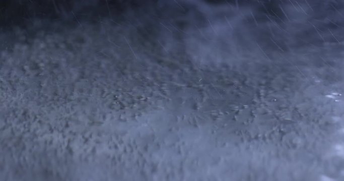 Boiling water surface in blue light