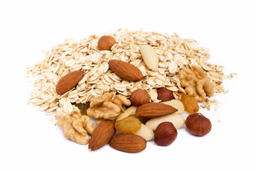 Mix nuts, raisins and oatmeal isolated on white background
