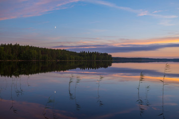 Colorful summer night lake landscape after sunset