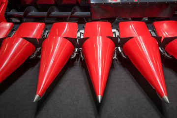 Red corn reaper header for combine close