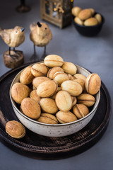 Traditional Russian dessert - nuts from short pastry with boiled condensed milk, caramel cream