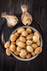 Traditional Russian dessert - nuts from short pastry with boiled condensed milk, caramel cream