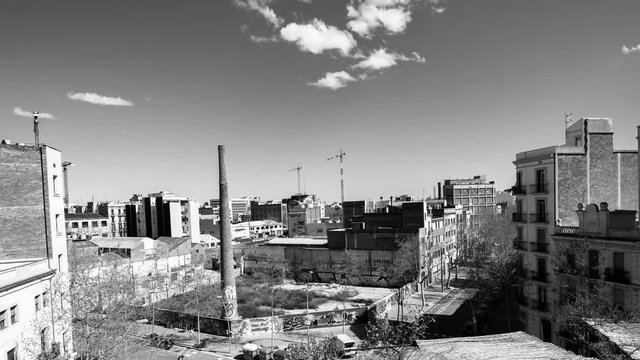 timelapse view of a street corner in the industrial neighbourthood of poblenou, barcelona