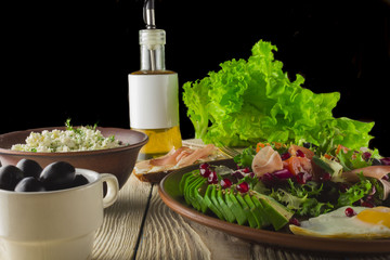fresh salad with tomato, egg and toast