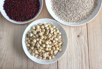 Topview mix Cereal,red bean , soy bean and lotus seed on the table.