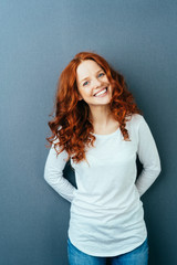 Happy friendly young woman with a lovely smile