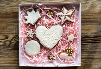 Cooking. Gift gingerbread in the form of heart, star and crown in package