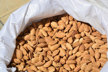 Almonds in a bag with its shell