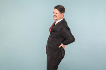Businessman have kidney, lower back or hernia pain
