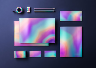 Holographic metallic mock up for business identity. Set of catalogue, folder, card, envelope, pencils, tape and eraser isolated on dark background. Metallic surface objects in 3D render illustration.