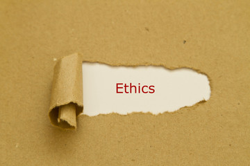 Ethics written under torn paper.