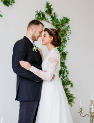 Portrait of married couple. white background