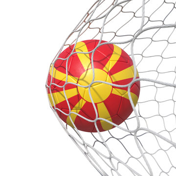 Macedonia Macedonian flag soccer ball inside the net, in a net.