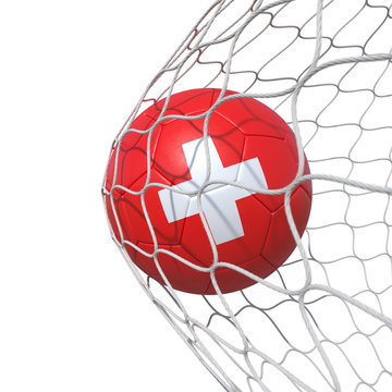 Switzerland Swiss flag soccer ball inside the net, in a net.