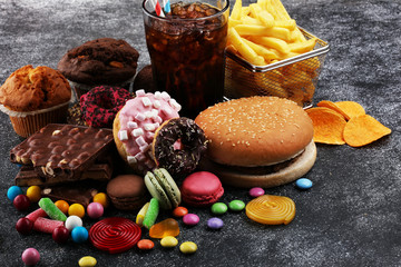 Fototapeta na wymiar Unhealthy products. food bad for figure, skin, heart and teeth.
