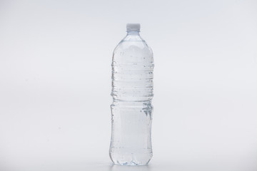 Fototapeta premium Water and bottle isolated