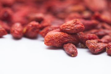 Background view of dried red goji berries Chinese matrimony vine 