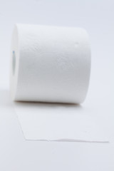 White toilet paper roll isolated on a white background