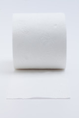 White toilet paper roll isolated on a white background