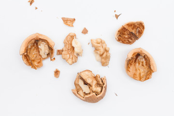 Cracked walnut isolated on the white background