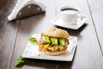 sandwich with bacon, egg and avocado