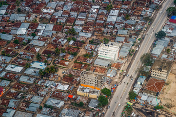 Zanzibar shanty town rusty roofs aerial view