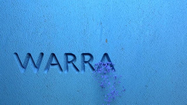 WARRANTY word carved in blue stone wall animation
