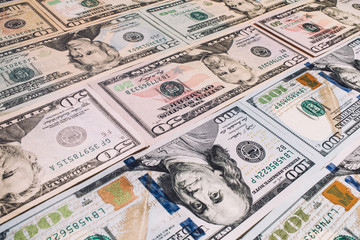 Photo of different banknotes US dollars, combined together. Isol