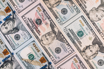 Photo of different banknotes US dollars, combined together. Isol
