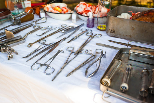 old medical instruments and tools on the table