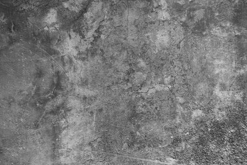 Texture of a black and white scratched, weathered wall