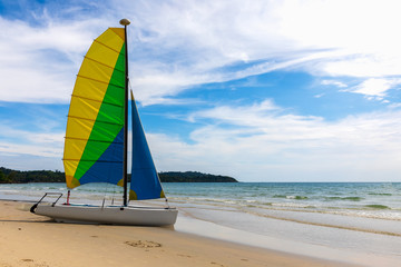 Sailboats moored on the beach with a beautiful sky in the summer.