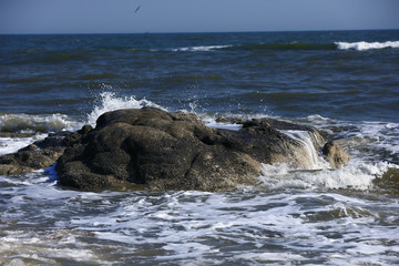 Fototapeta na wymiar The waves of the sea