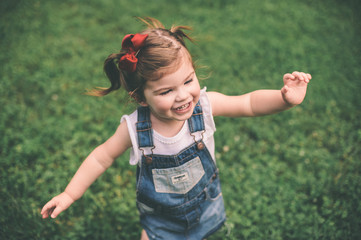 Young girl running and smiling