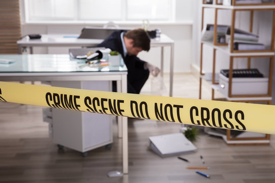 Close-up Of Yellow Crime Scene Tape