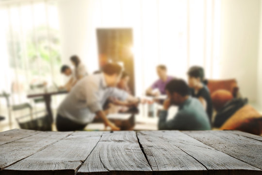 Desk Wood Space Platform With Business People In A Meeting At Office In Morning LightFor Product Display Montage.
