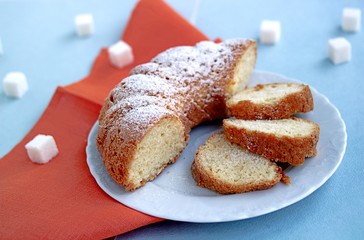 Cupcake on egg whites, sprinkled with powdered sugar