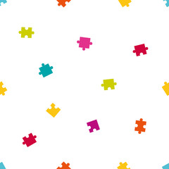 Seamless pattern of colorful jigsaw puzzle pieces.