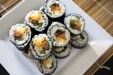 Kimbap filled with vegetables, egg and ham