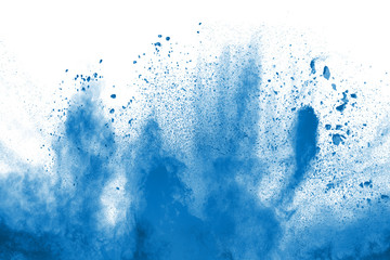 Abstract blue dust explosion on white background.Abstract color powder splatted background