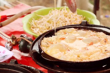 Crispy fried mussels with egg