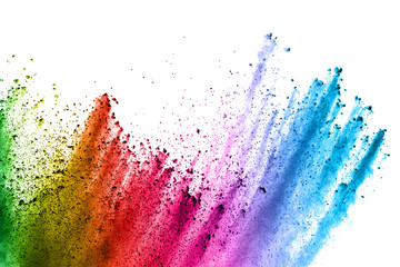 Explosion of colored powder on white background