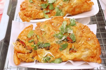 Crispy fried mussels with egg