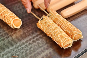 Pancake with sausage at street food