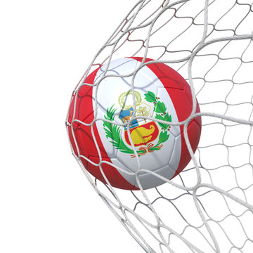 Peru Peruvian flag soccer ball inside the net, in a net.