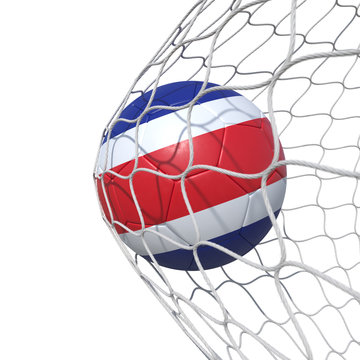 Costa Rica flag soccer ball inside the net, in a net.