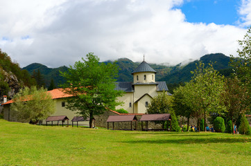 Famous monastery of Moraca on background of mountains on sunny day, Montenegro