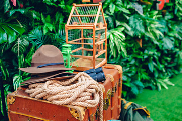 Equipment set for adventure. Hats, rope, binoculars, lantern, suitcase.