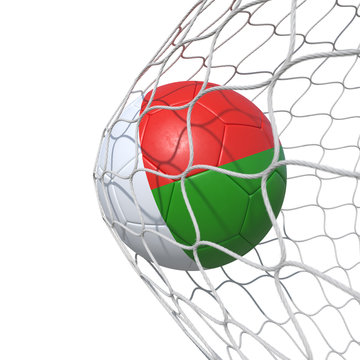 Madagascar Madagascan flag soccer ball inside the net, in a net.