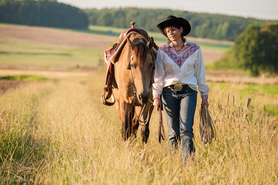 Cowgirl with Horses